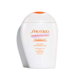 A  closed, rounded white bottle of Shiseido Urban Environment Oil-Free Sunscreen SPF 42 143mL against a white background. The label includes the product name, as well as describing that it is oil-free, contains hyaluronic acid, is a broad spectrum product, and is water resistant up to 40 minutes. The image also states that this product is recommended for daily use by the Skin Cancer Foundation, and it is also a US Winner for Marie Claire&rsquo;s Prix D&rsquo;Excellence De La Beaut&eacute; 2023.  